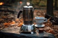 coffee brewing in a vintage percolator on campfire grate Royalty Free Stock Photo