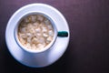 Coffee in cafe with marshmallow with blurred background.