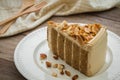 Coffee cake with almonds on plate Royalty Free Stock Photo