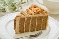 Coffee cake with almonds on plate Royalty Free Stock Photo