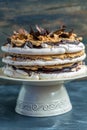 Coffee cake with meringue, hazelnut and chocolate.