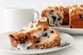 Coffee cake on a white plate, close up table scene Royalty Free Stock Photo