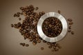 Coffee canister lid and coffee beans scattered on the table