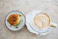 Coffee cappuccino with whipped sweet cake with grinding. Royalty Free Stock Photo