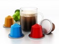 Coffee capsules and mug isolated on white background. 3D illustration