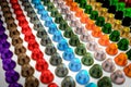 Coffee capsules multicolored aranged in rows