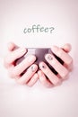 Coffee card. Beautiful female hands holding black cup on bright green background. Manicure with pink color nail polish, black Royalty Free Stock Photo