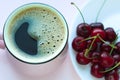 Coffee and cherries, minimalistic food concept. Top view, copy space