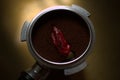 Coffee with chili pepper Royalty Free Stock Photo