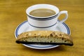 Coffee with a chocolate biscotti Royalty Free Stock Photo