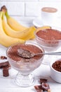 Coffee and chocolate dessert in a glass jar on the wooden table Royalty Free Stock Photo