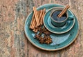 Coffee with cinnamon and star anise spices. Vintage style Royalty Free Stock Photo