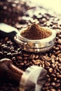 Coffee.Coffee beans. Coffee beans and portafilter. Toned image Royalty Free Stock Photo