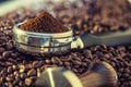 Coffee.Coffee beans. Coffee beans and portafilter. Toned image Royalty Free Stock Photo