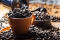 Coffee. Coffee cup full of coffee beans, coffee grinder in the background Royalty Free Stock Photo