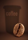 Coffee concept, bean with paper cup shadow on brown background Royalty Free Stock Photo