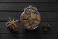 Coffee cookies in jar with cinnamon and anise