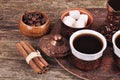 Coffee in copper coasters with accessories for coffee-drinking o Royalty Free Stock Photo