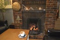 Coffee And A Cosy Fireplace