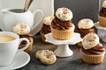 Coffee and cream cupcakes decorated with donuts