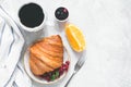Coffee, croissant, fruits and jam Royalty Free Stock Photo