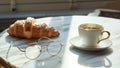 Coffee croissant and glasses in marble table in elegant cafe Royalty Free Stock Photo