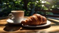 Coffee and Croissant on outdoor wooden table