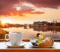 Coffee with croissants against Avignon old bridge in Provence, France Royalty Free Stock Photo