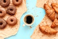 Coffee croissants and chocolate doughnuts for breakfast