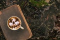 Coffee cup as jack o lantern pumpkin Royalty Free Stock Photo