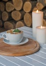 Coffee cup on bar table and romantic candles closeup Royalty Free Stock Photo