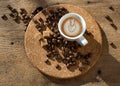 Coffee cup, beans, brown sugar on a wooden table Royalty Free Stock Photo