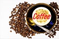 Coffee in a Cup and coffee beans, an invigorating natural drink