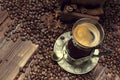 Coffee cup, beans and old coffee grinder Royalty Free Stock Photo