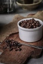 Coffee cup and beans on old kitchen table Royalty Free Stock Photo