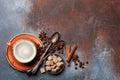 Coffee cup, beans, sugar and spices Royalty Free Stock Photo