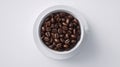 Coffee cup and beans on white background. Neural network AI generated Royalty Free Stock Photo
