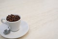 Coffee cup and beans on a white background. Top view with copy space for your text Royalty Free Stock Photo