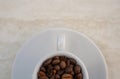 Coffee cup and beans on a white background. Top view with copy space for your text Royalty Free Stock Photo