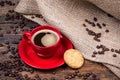 Coffee cup with biscuit and gunny textile