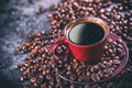 Coffee. Cup of black coffee and spilled coffee beans. Coffee break Royalty Free Stock Photo