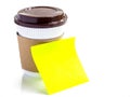 Coffee cup and blank yellow paper note isolated on white backgr Royalty Free Stock Photo