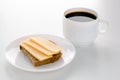 Coffee cup and cheese sandwith