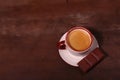 Coffee cup and chocolate on wooden table texture. Coffeebreak Royalty Free Stock Photo