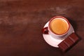 Coffee cup and chocolate on wooden table texture. Coffeebreak Royalty Free Stock Photo