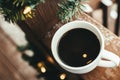Coffee cup with christmas lights