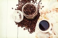 Coffee cup and coffee beans on table,banner free space for your text. Royalty Free Stock Photo