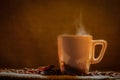 Coffee cup and coffee beans on a wooden table and sack background, Vintage color tone Royalty Free Stock Photo