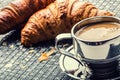 Coffee. Cup of coffee. Stainless steel cup of coffee and two croissants. Coffee break business break Royalty Free Stock Photo
