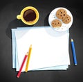 Coffee cup and color pencils laying on paper Royalty Free Stock Photo